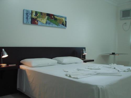 Ένα ή περισσότερα κρεβάτια σε δωμάτιο στο Hotel FIT