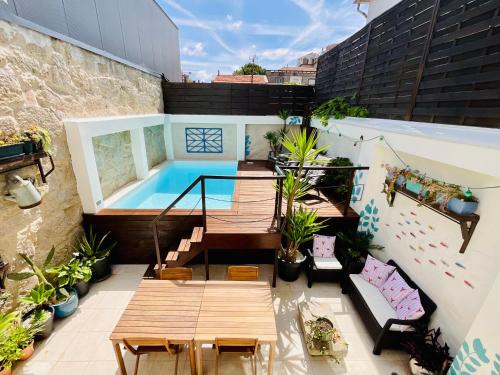 a balcony with a swimming pool on a building at Boreal Porto Gaia - Patio & Pool in Vila Nova de Gaia