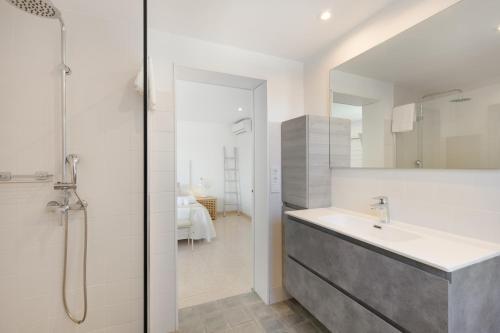 a bathroom with a sink and a shower at V206 Villa Isabel in Son Bou