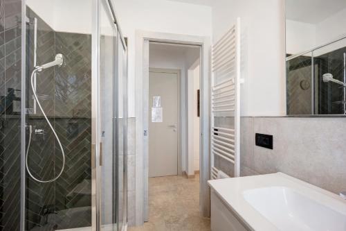 a bathroom with a shower and a sink at Antichi Ricordi - Il Pollaio in Marina di Andora