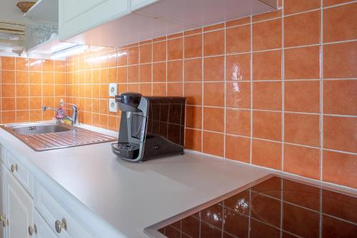 Køkken eller tekøkken på Appartement Stomolocation