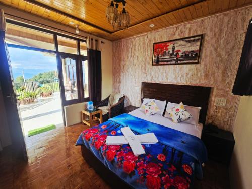 a bedroom with a bed with a cross on it at Smarthill Deodar Echoes in Dalhousie