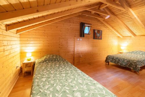 Llit o llits en una habitació de Chalet Sardane