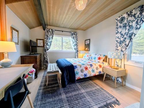 a bedroom with a bed and a window at 81 Meadow Lane in Sunriver