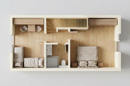 a model of a bathroom with towels at FeWo Am Pier 7a in Loddin