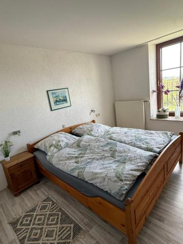 a bedroom with a bed in a room at Gästehaus Klausenhof in Klausen