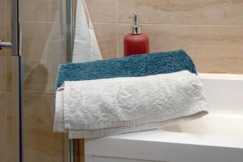 a towel sitting on top of a bathroom sink at Chez Pierre et Germaine in Saint-Maurice-de-Rotherens