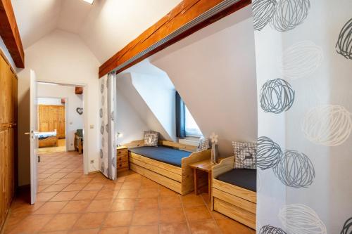 a room with two bunk beds in a house at Schwarzwaldnest in Bad Wildbad