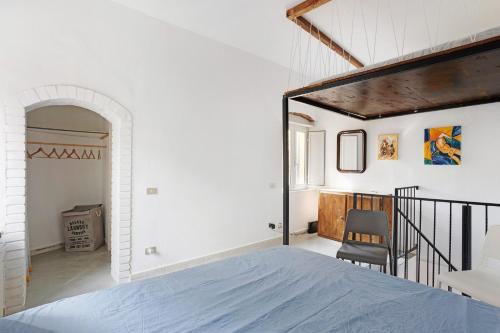 a bedroom with a large bed in a room at Uliveto in Lerici