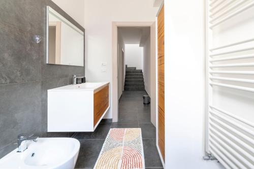 a bathroom with a sink and a toilet in it at Villa Venza , Salento in Otranto