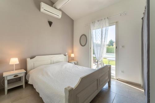 Postel nebo postele na pokoji v ubytování Chez Céline