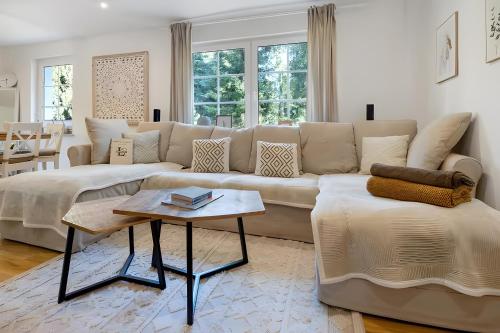 a living room with a couch and a table at Landhaus Schwerin in Kirch Jesar