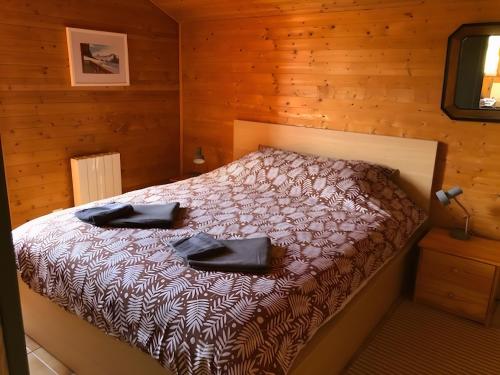 Llit o llits en una habitació de Chalet L'oréade