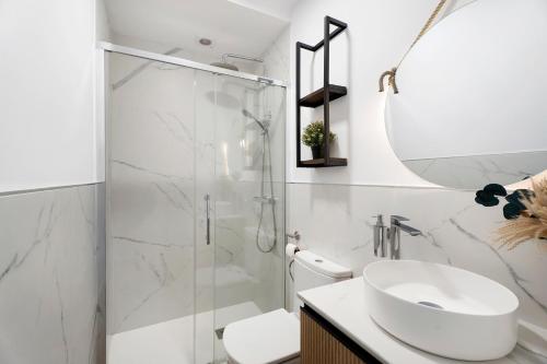 a bathroom with a shower and a sink and a toilet at Casa Tagoro Dream in Costa Del Silencio