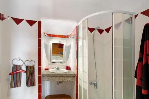 a bathroom with a shower and a sink at Finca Fani 1 in Agüimes