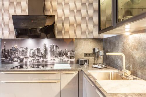 a kitchen with a sink and a counter top at Marisa's Sauerlandträumchen in Brilon