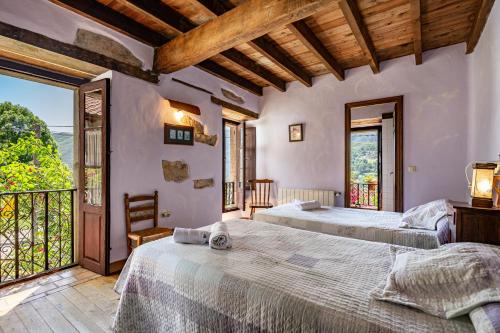 Tempat tidur dalam kamar di La Valleja