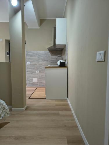 a kitchen with a sink and a counter in a room at RHouse in Rho