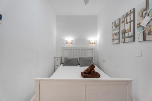 a bedroom with a bed with a teddy bear on it at Charming one bedroom Los Cristianos in Arona