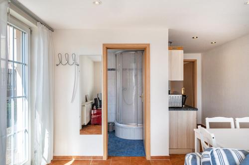 a bathroom with a shower in a room at Moewentraum in Malchow