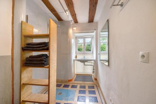 a small bathroom with a sink and a mirror at Alte Mühle in Dernbach in Dernbach
