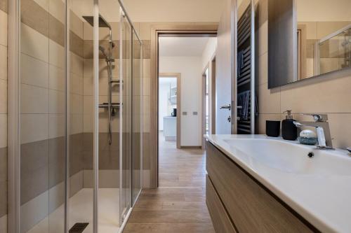 a bathroom with a sink and a shower at Agriturismo Bocca Nevese Abete in Tremosine Sul Garda