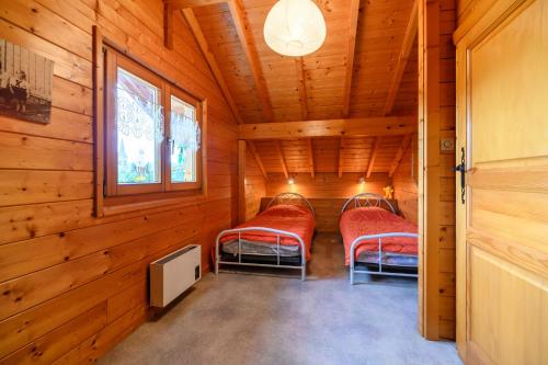 Postel nebo postele na pokoji v ubytování Notre chalet