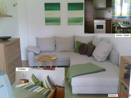 a living room with a couch and a kitchen at Haus Schnitzler in Wasserburg