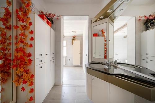 a bathroom with a sink and a mirror at Oasi Torre Di Mastro, Conversano in Conversano