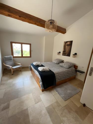 Postel nebo postele na pokoji v ubytování Maison du soleil