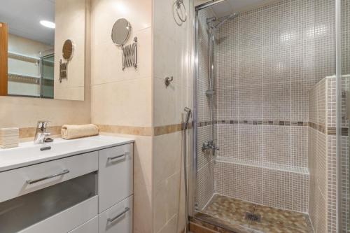 a bathroom with a shower and a sink and a toilet at Topacio A114 in Mijas Costa