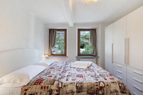 Llit o llits en una habitació de Maison Sandra