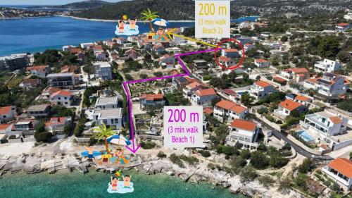 an aerial view of a resort with an amusement park at Sevid Seaview Apartments in Sevid