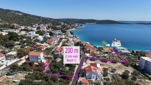 an aerial view of a property with a private beach at Sevid Seaview Apartments in Sevid
