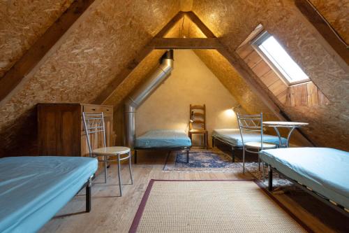 Llit o llits en una habitació de Gîte d'étape
