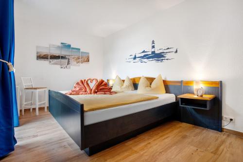 a bedroom with a bed in a room at Ferienwohnung Abendrot 299 in Ueckermünde