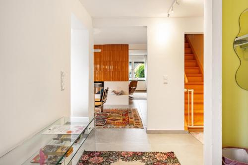 a hallway with a glass counter in a house at Dahlienhof in Wittenberge