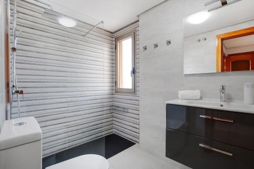 a bathroom with a toilet and a sink at Apartamento Relax and Dream in Pájara
