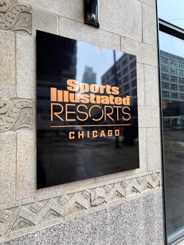 a sign on the side of a building at Sports Illustrated Resorts Chicago in Chicago