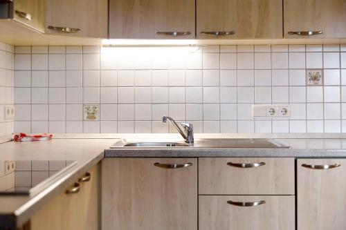 a kitchen with a sink and a counter at Mattleitenhof in Santa Maddalena