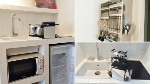 a kitchen with a sink and a microwave at Denis & Virginie - château à pied - parking gratuit in Versailles