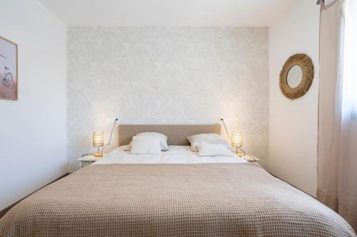 Llit o llits en una habitació de Villa Léonie