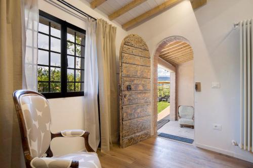 an entrance to a home with an open door at Bellavista Cottage in Barberino di Mugello