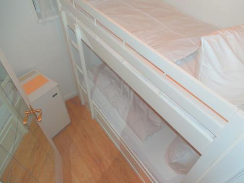 Una cama o camas en una habitación de Hotel Christiansen