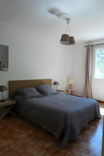Un pat sau paturi într-o cameră la Villa Gabriel
