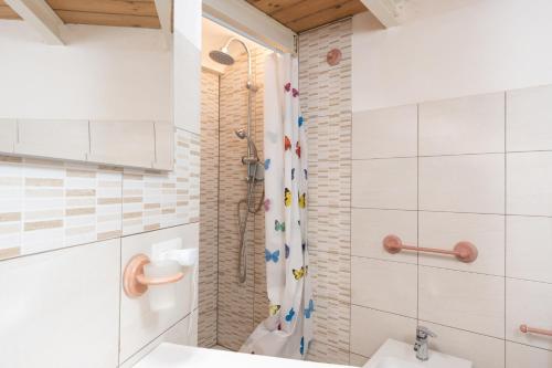 a bathroom with a shower and a toilet at Seacastle Sicily in Castellammare del Golfo