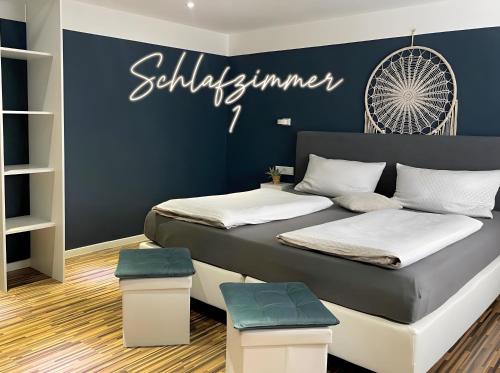 a bedroom with two beds and a sign that reads psychiatrist at Fewo Harzblick Goslar mit Pool in Goslar