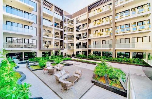 Luxury 2BR Apartment JVC Dubai Pool Gym Health Club Concierge