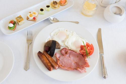 a plate of breakfast food on a table at Kilbree House B&B in Galway