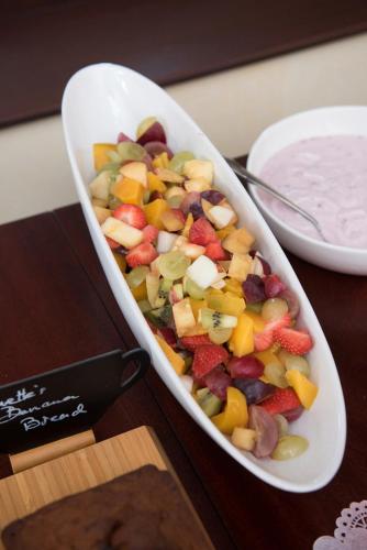 a bowl of fruits and vegetables on a table at Kilbree House B&B in Galway